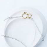 “LE FIL”, NECKLACE IN PASSIVATED SILVER AND 18 CARAT GOLD VERMEIL