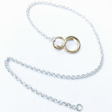 “LE FIL”, NECKLACE IN PASSIVATED SILVER AND 18 CARAT GOLD VERMEIL